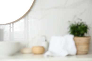Photo of Blurred view of stylish modern bathroom with toiletries