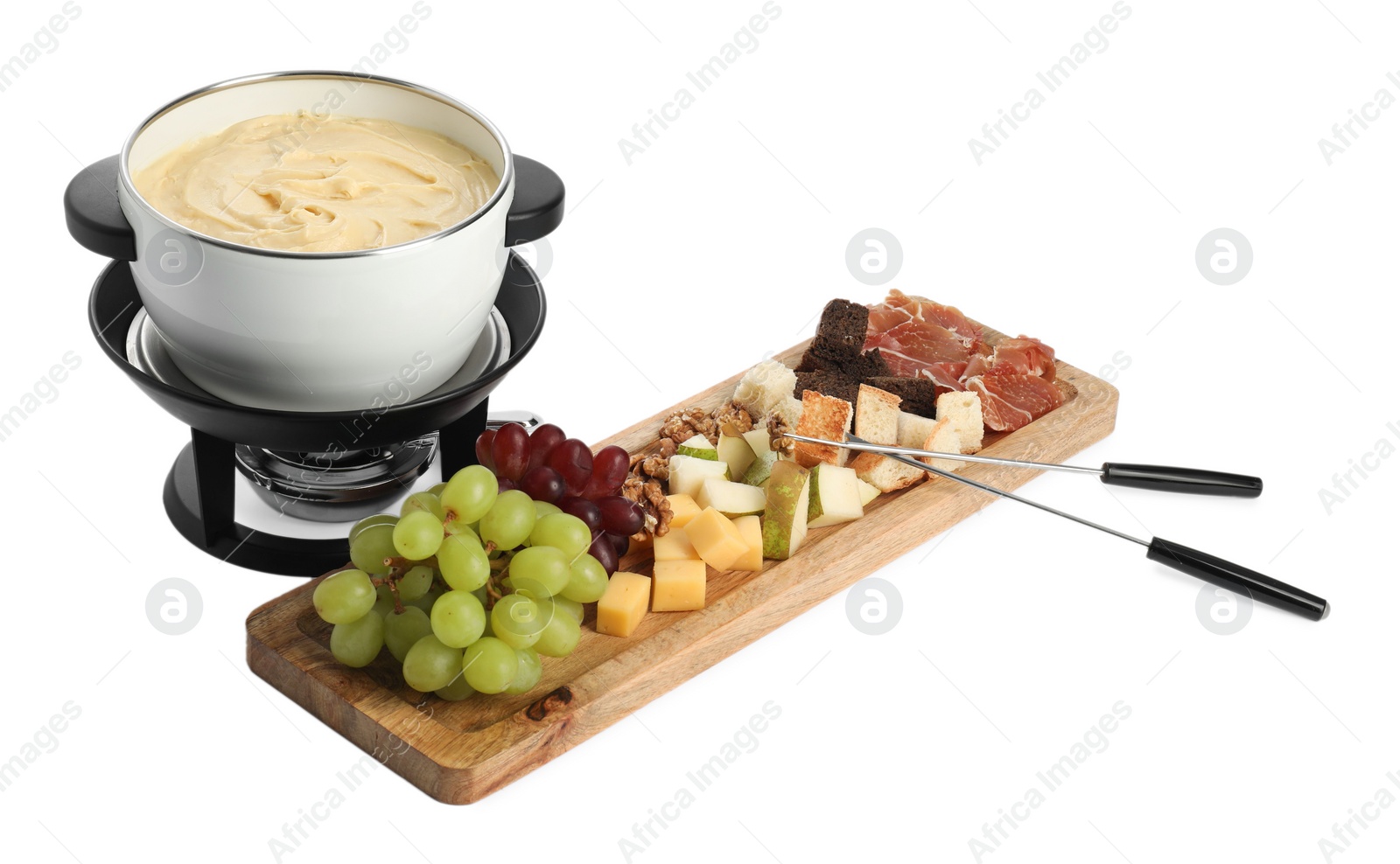 Photo of Fondue with tasty melted cheese, forks and different snacks isolated on white