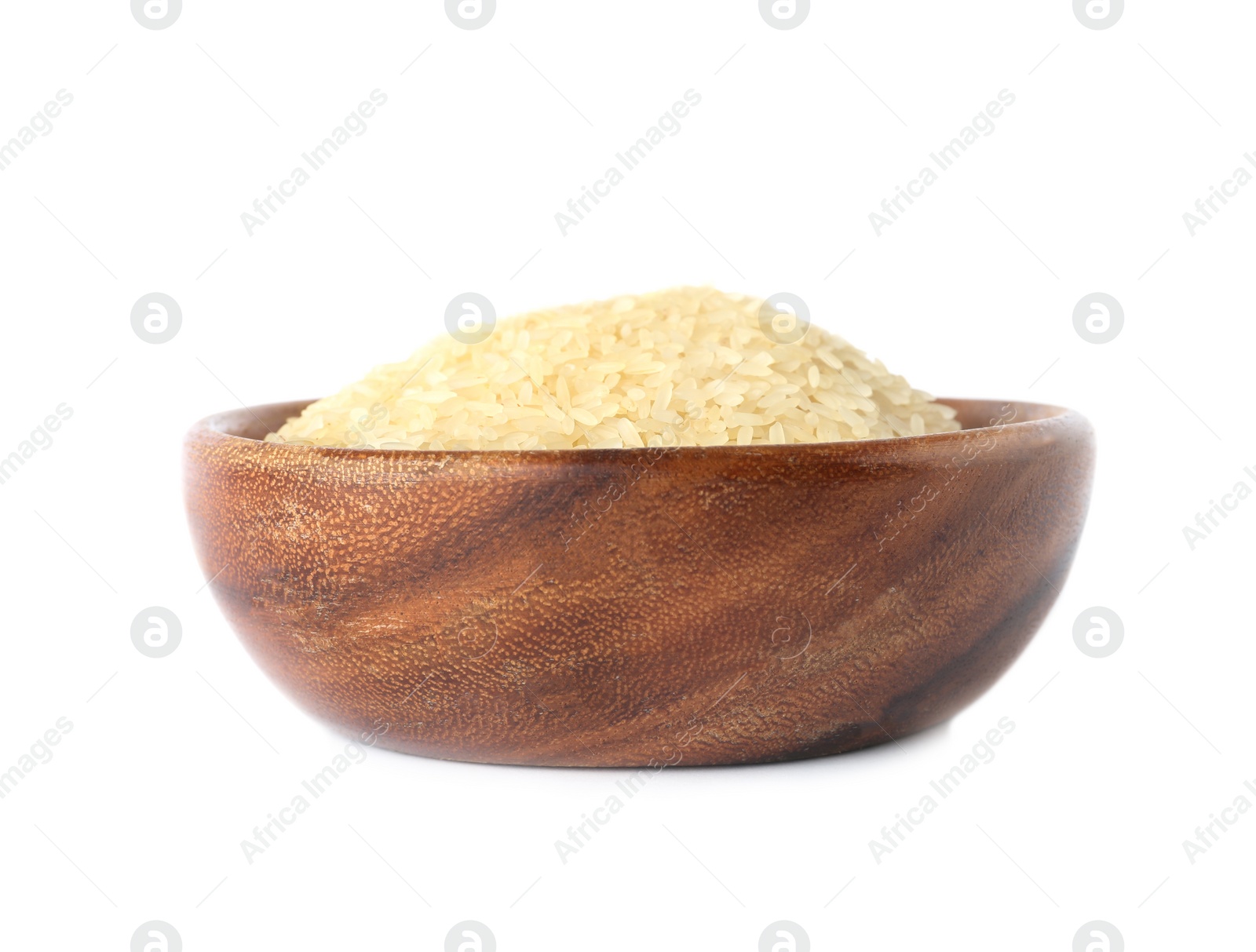 Photo of Bowl with uncooked parboiled rice on white background