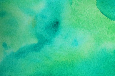 Photo of Abstract green watercolor painting as background, top view