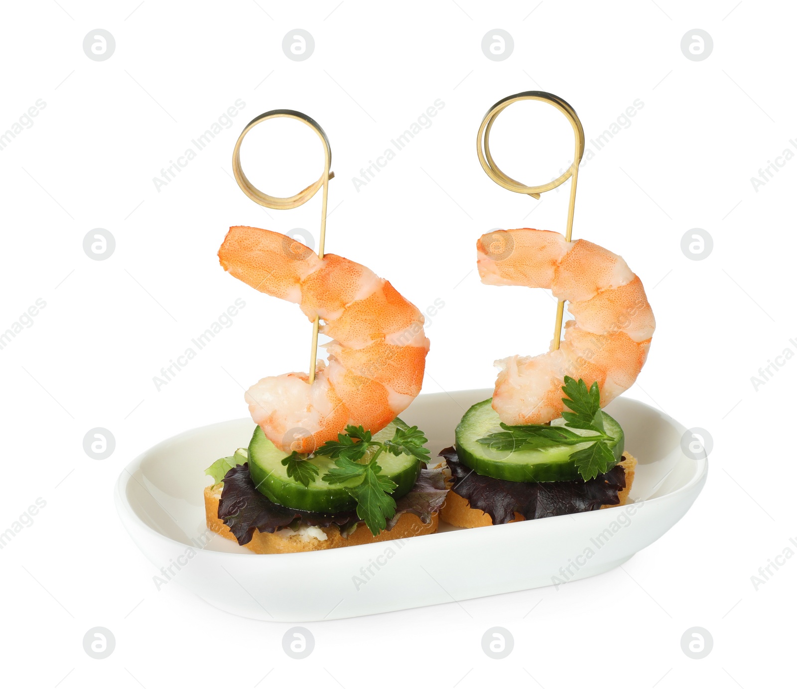 Photo of Tasty canapes with shrimps, greens and cucumber isolated on white