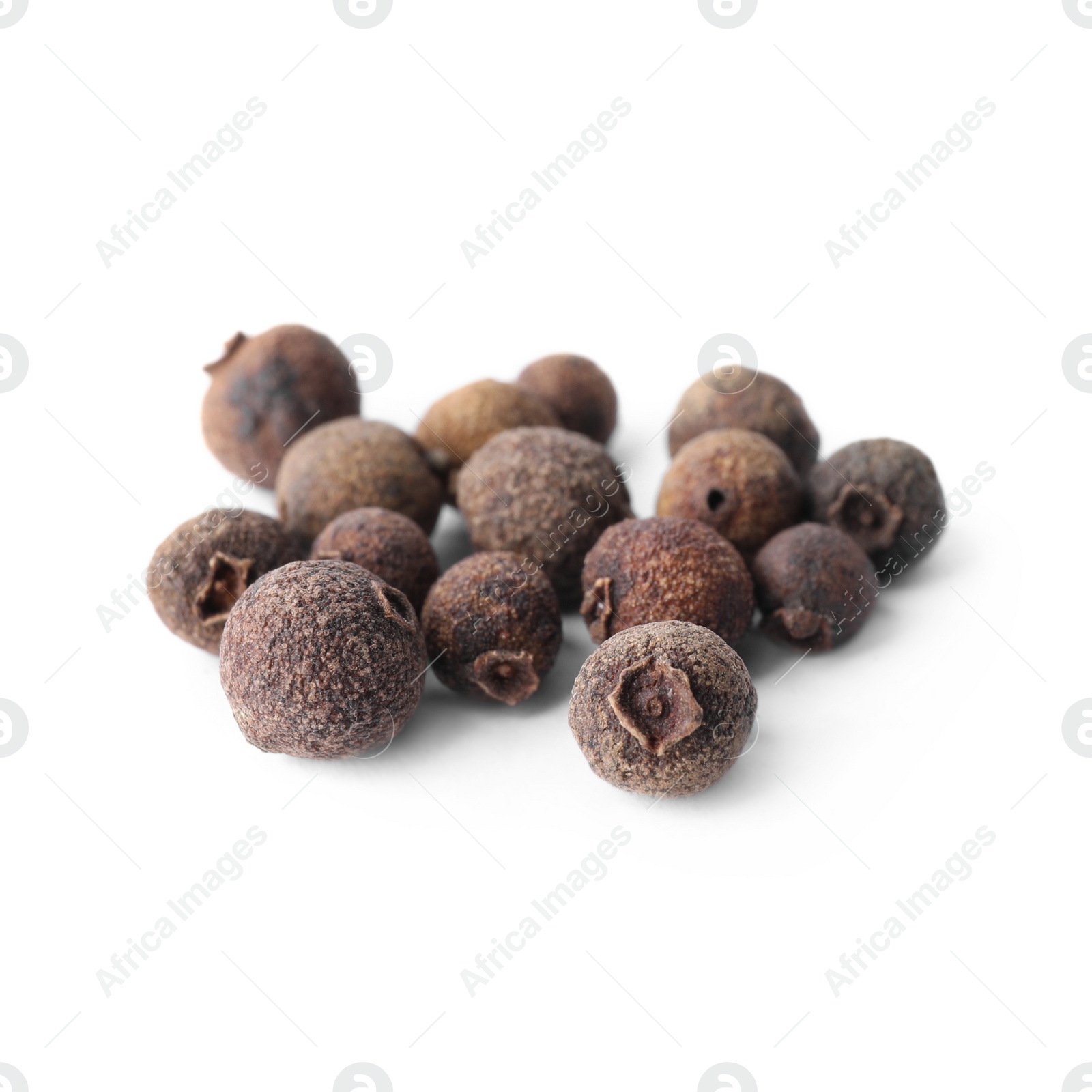 Photo of Spicy black pepper grains isolated on white