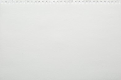 Photo of Blank notebook sheet as background, top view