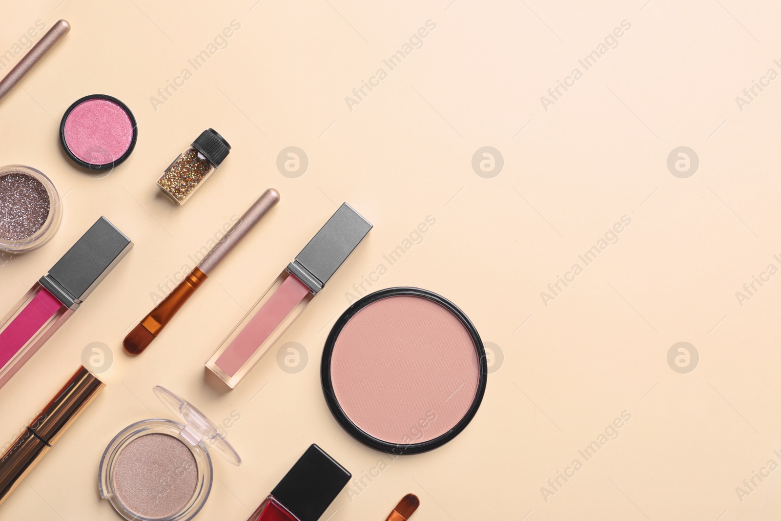 Photo of Beautiful composition with lipsticks on color background, flat lay. Space for text