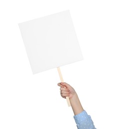 Woman holding blank protest sign on white background, closeup