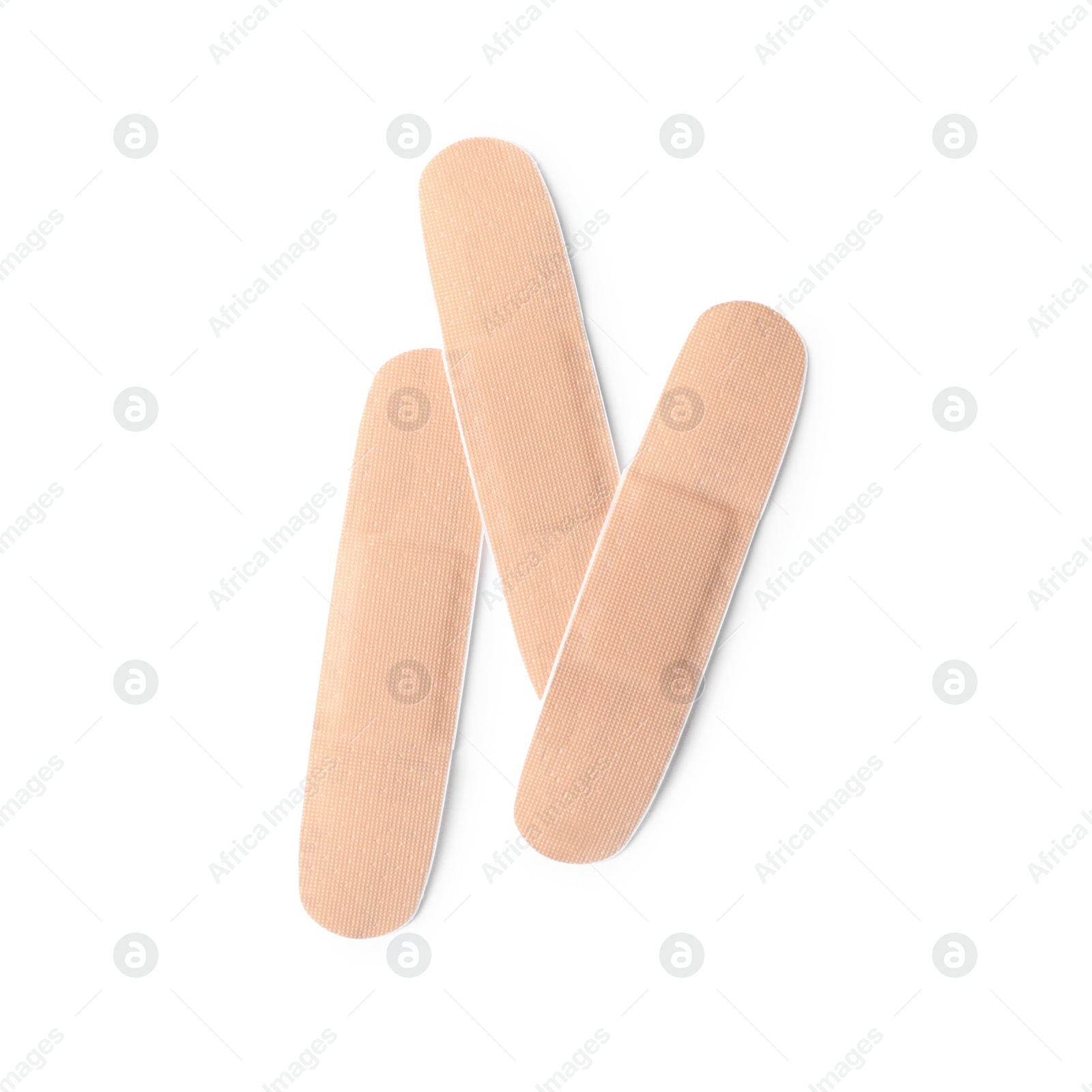Medical sticking plasters isolated on white. First aid item Photo of Medical sticking plasters isolated on white. First aid item
