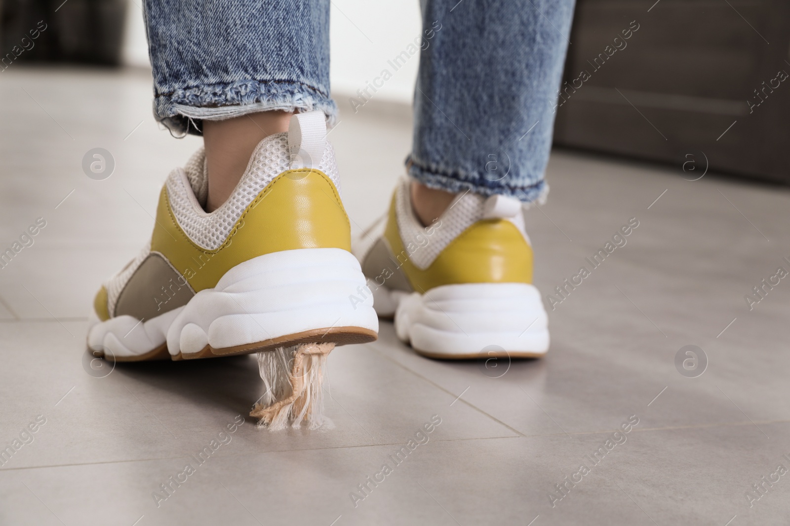 Photo of Person stepping into chewing gum on floor, closeup