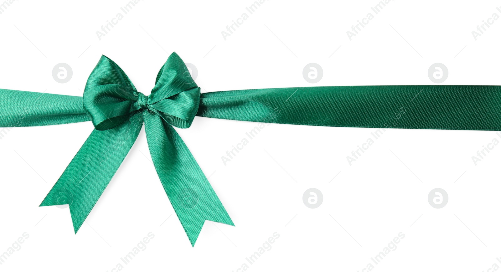 Photo of Green satin ribbon with bow isolated on white, top view