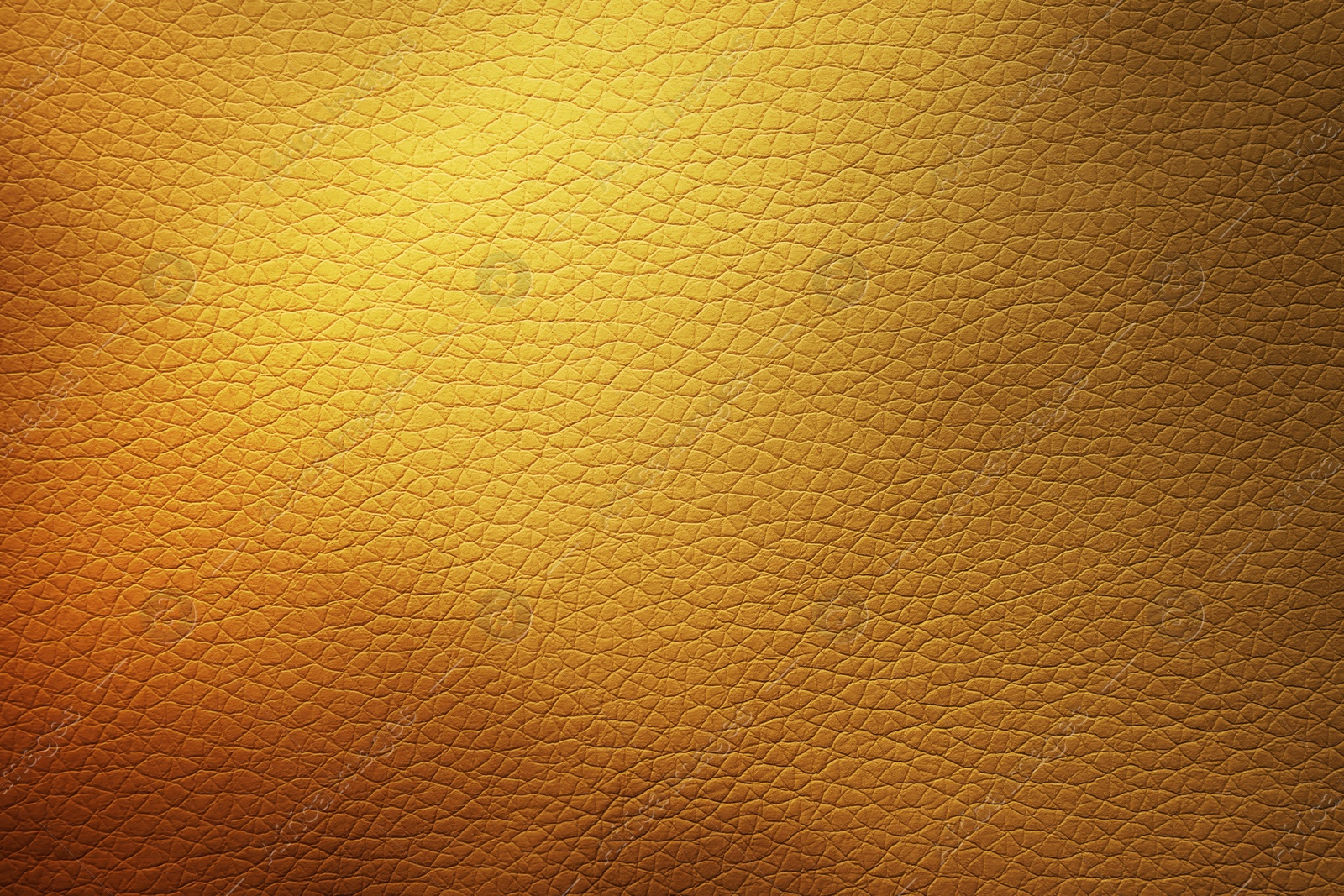 Image of Golden textured surface as background, closeup view