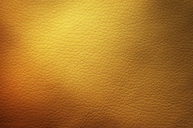 Image of Golden textured surface as background, closeup view