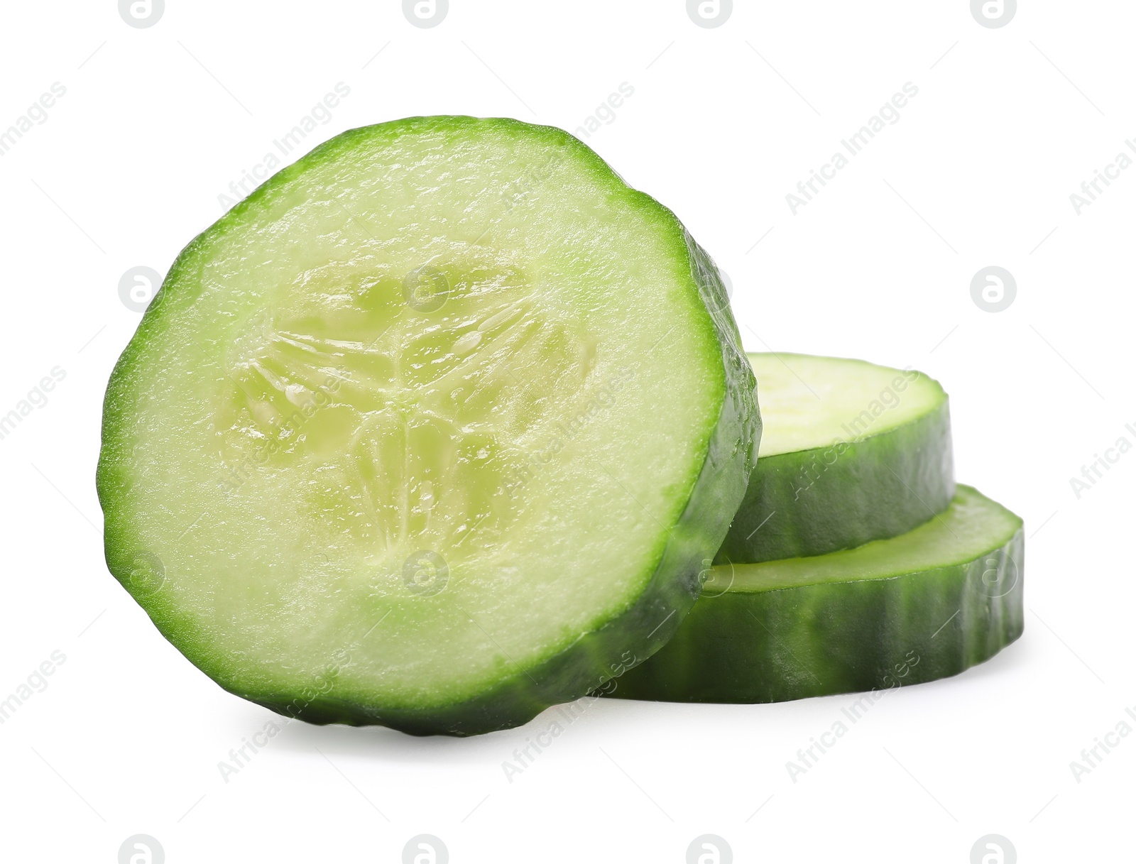 Photo of Slices of fresh cucumber isolated on white