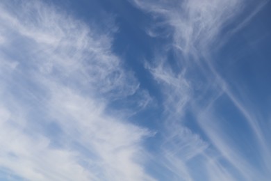 Beautiful fluffy white clouds in blue sky