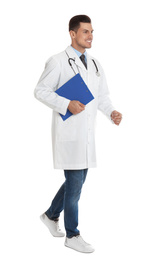 Photo of Doctor with clipboard walking on white background