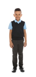 Full length portrait of cute African-American boy in school uniform on white background