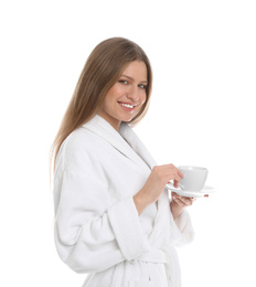 Photo of Young woman in bathrobe with cup of beverage on white background