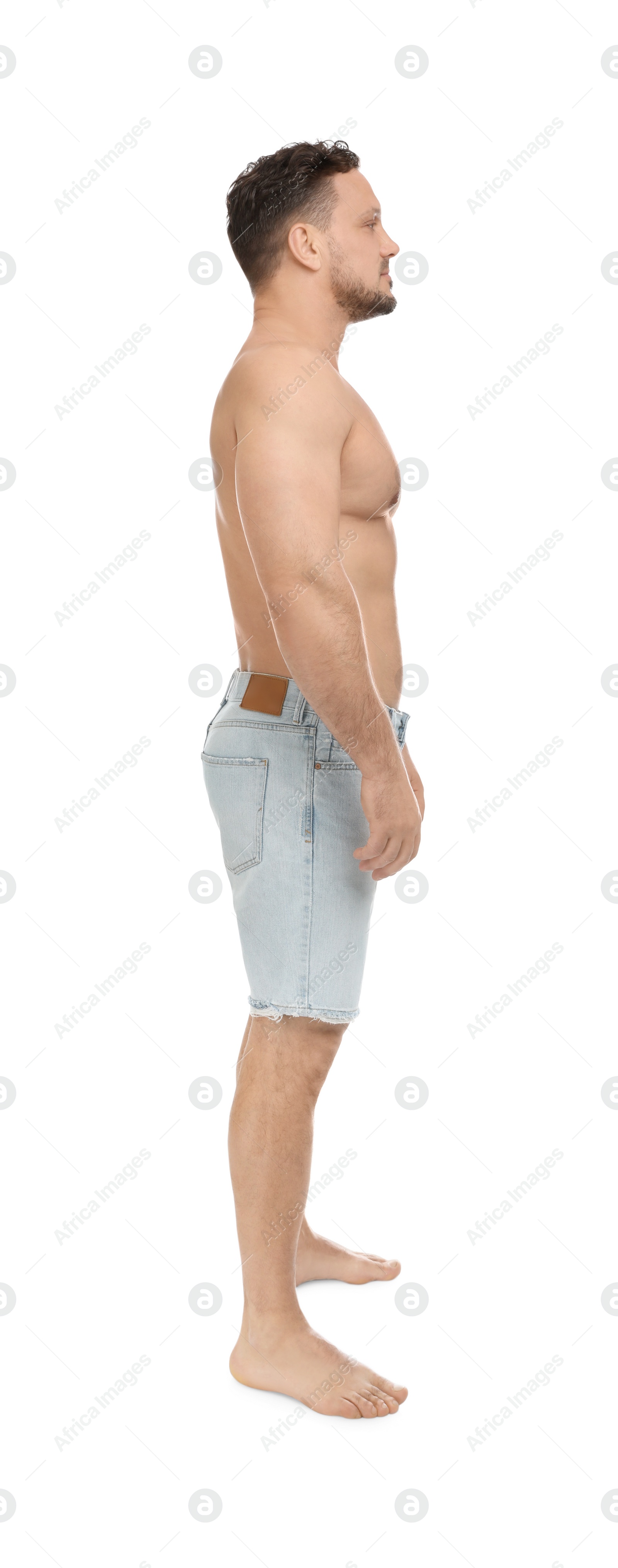 Photo of Full length portrait of shirtless man on white background