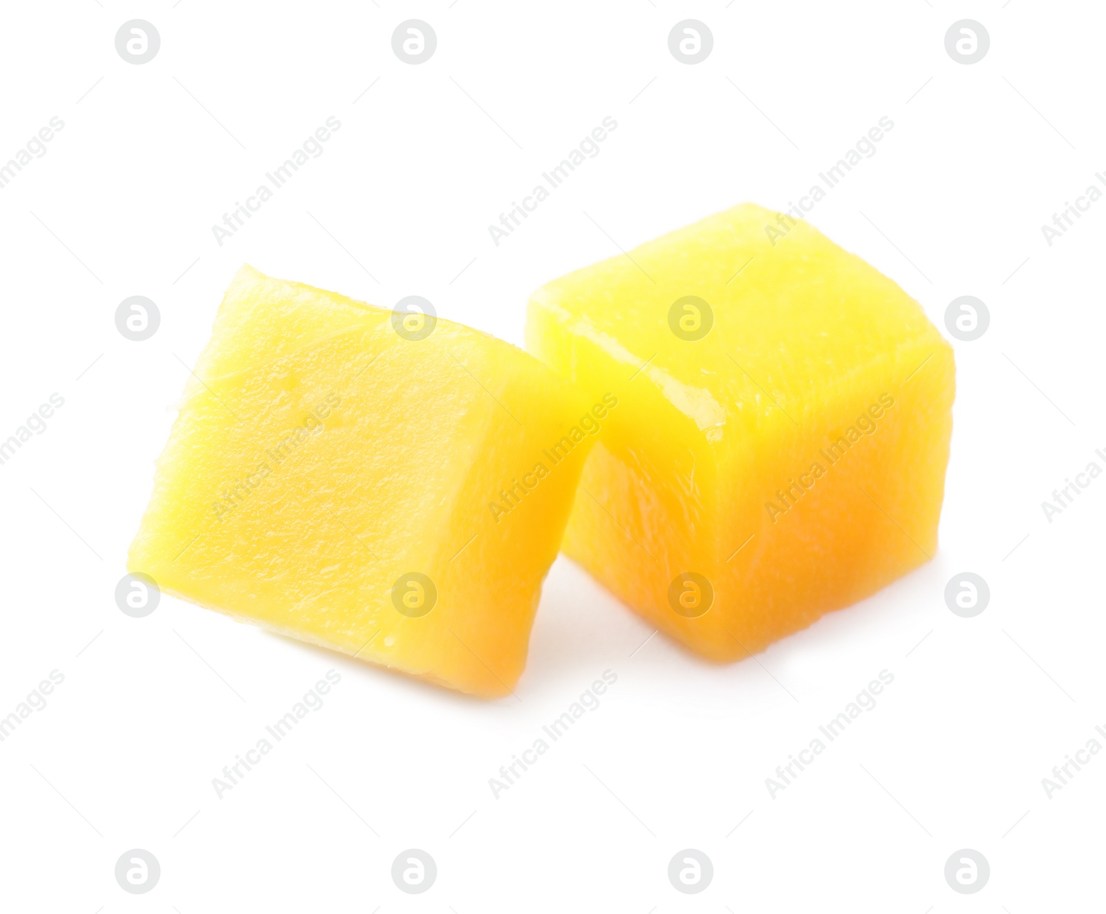 Photo of Fresh juicy mango cubes isolated on white