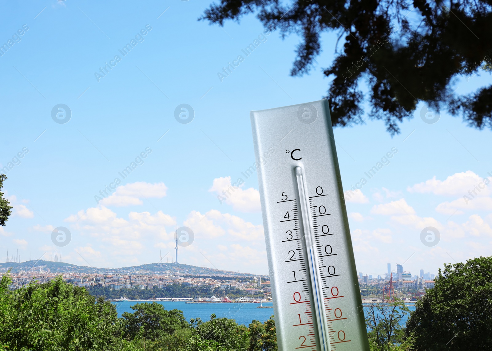 Image of Weather thermometer and view of beautiful city and sea on background, space for text