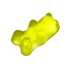 Delicious yellow jelly bear on white background