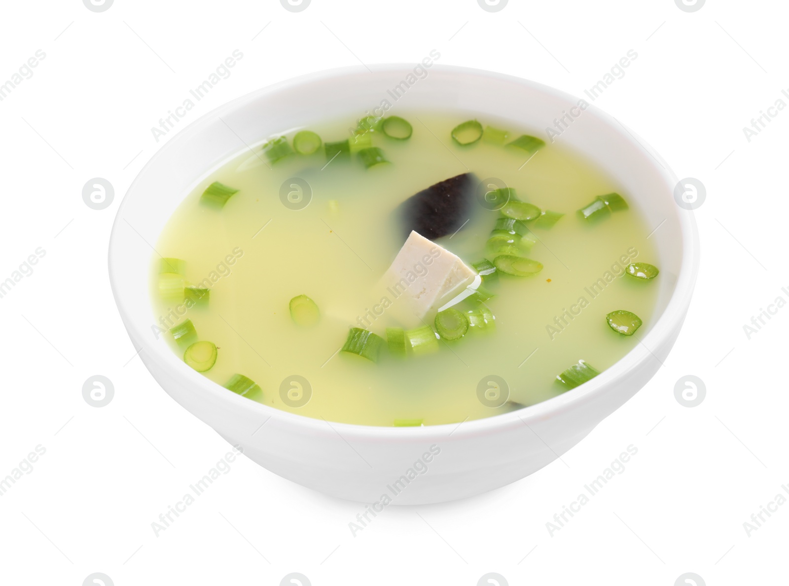 Photo of Bowl of delicious miso soup with tofu isolated on white