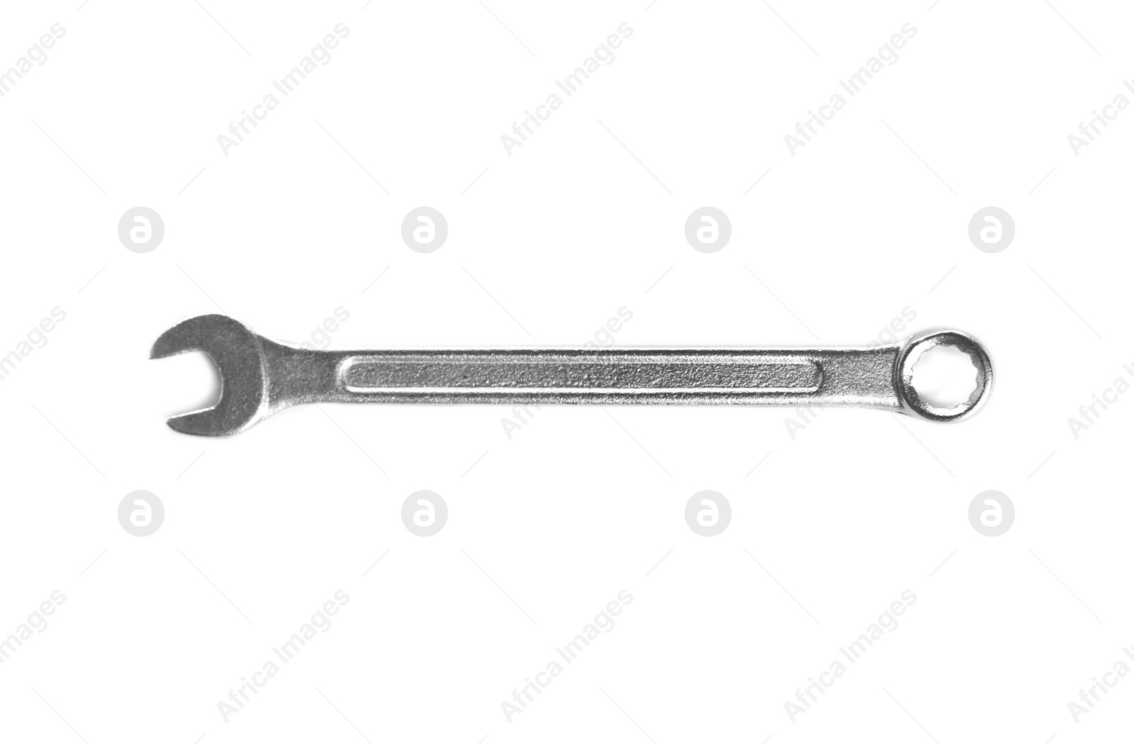 Photo of New wrench on white background, top view. Construction tools