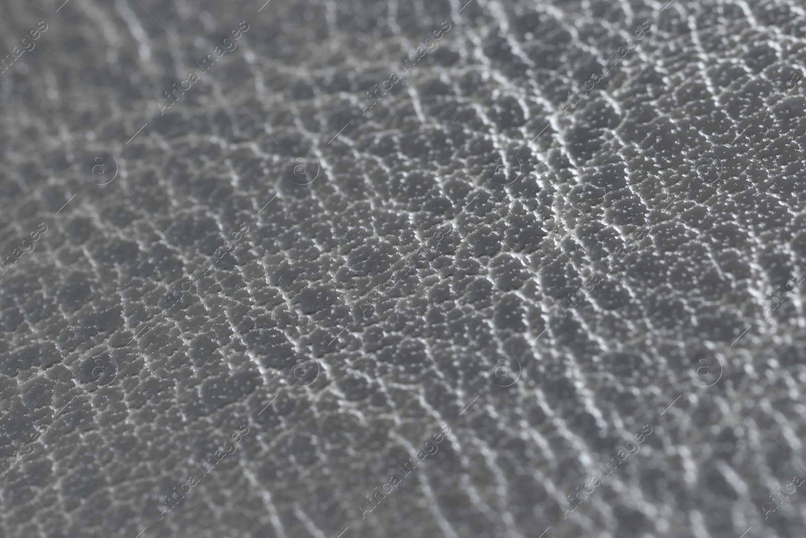 Photo of Beautiful grey leather as background, closeup view