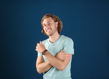 Photo of Portrait of handsome man on color background