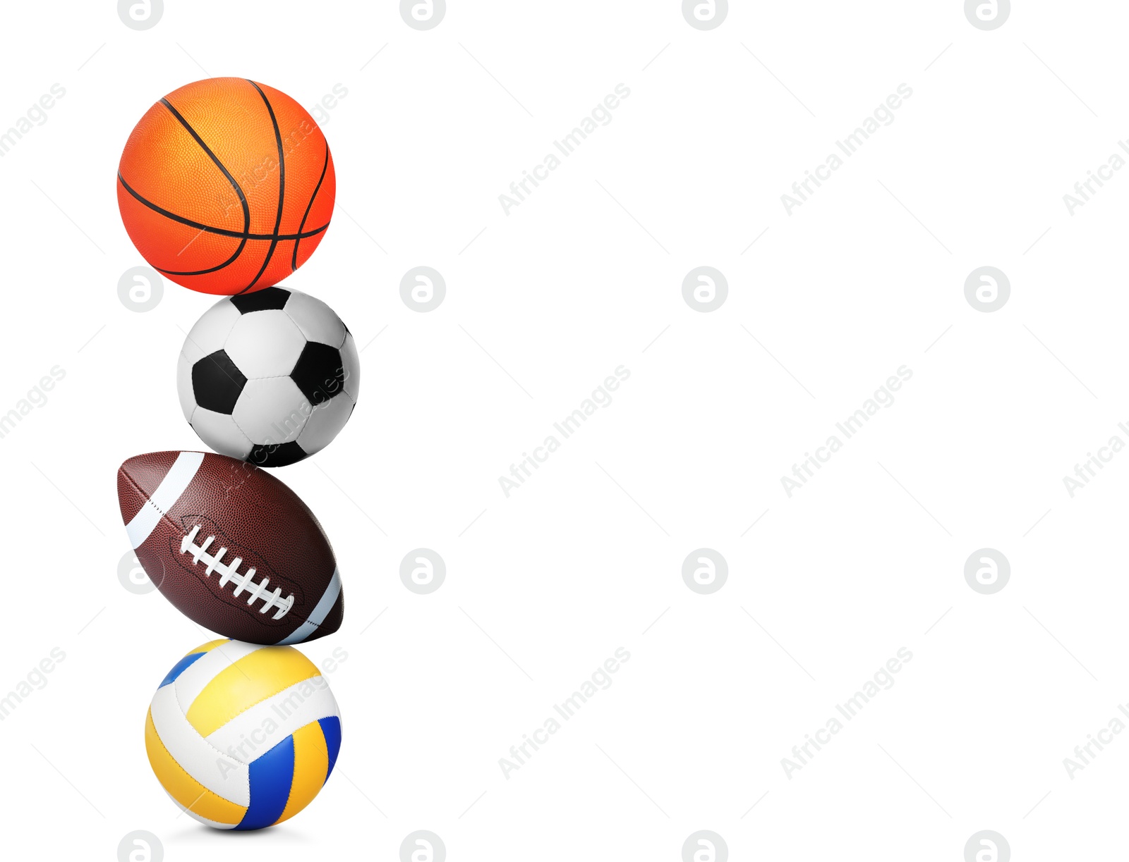 Image of Stack of different sport balls on white background