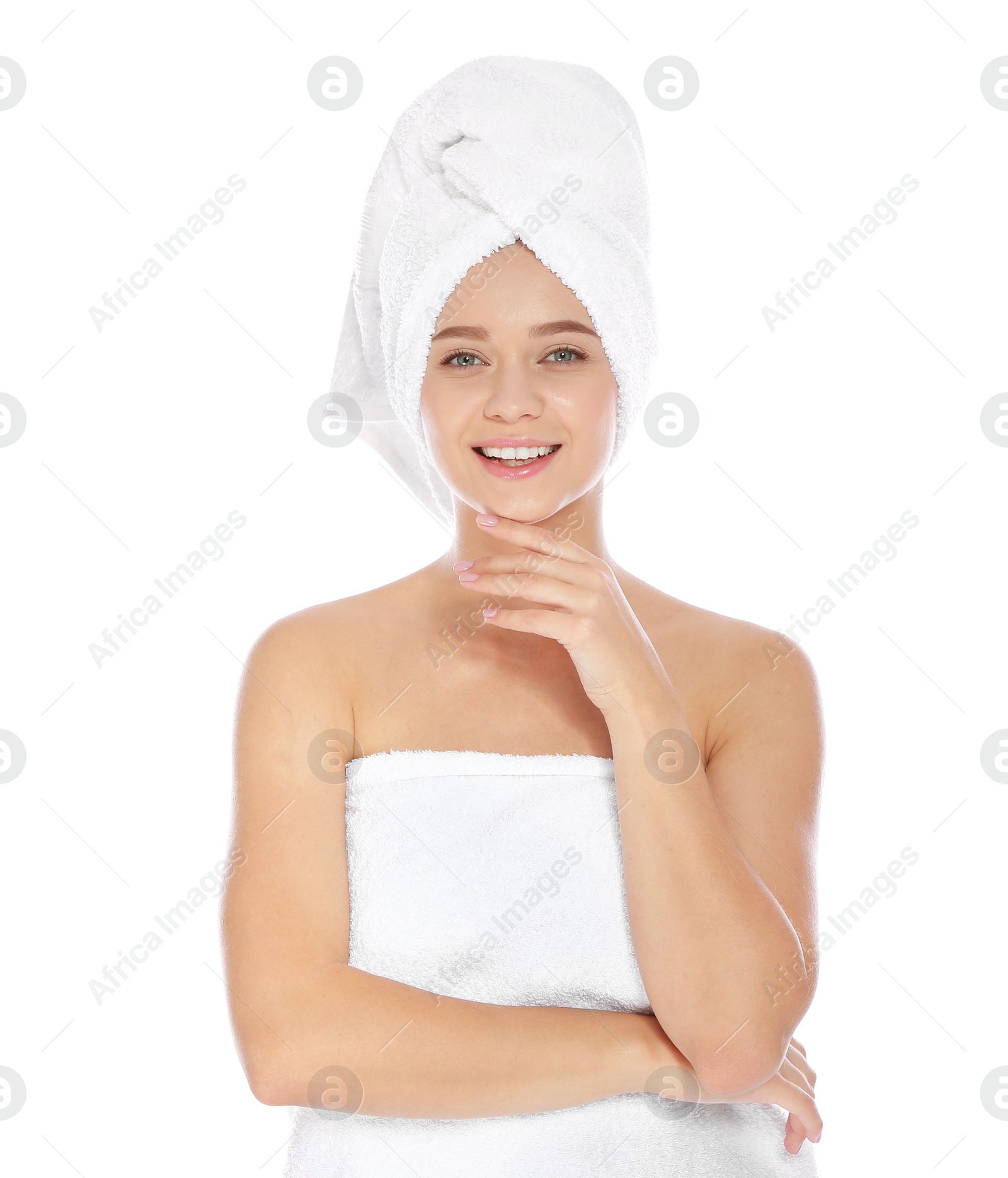 Photo of Portrait of young pretty woman with towels on white background