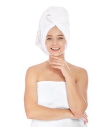 Photo of Portrait of young pretty woman with towels on white background