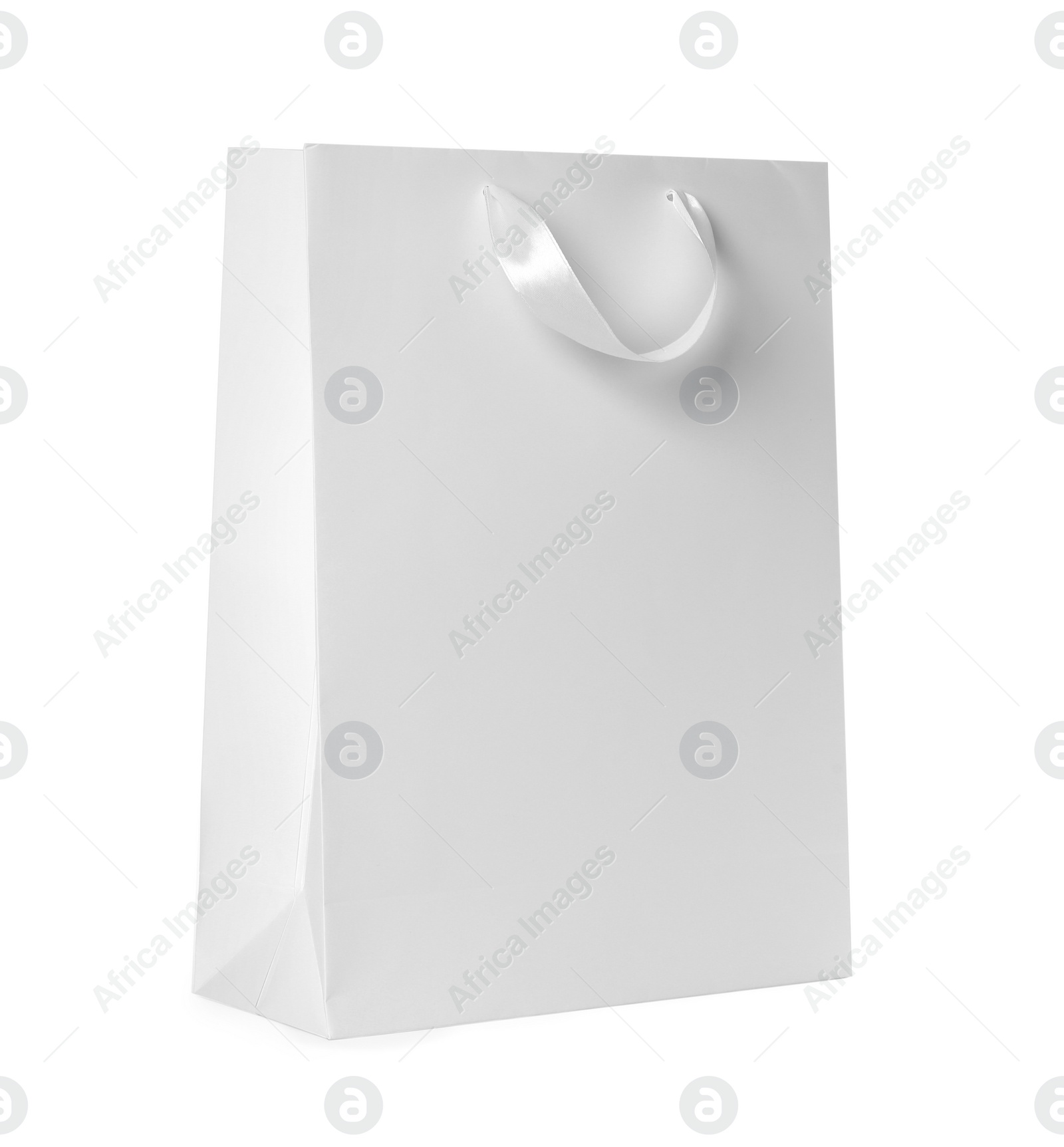 Photo of Paper shopping bag isolated on white. Mock up for design