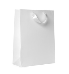 Photo of Paper shopping bag isolated on white. Mock up for design