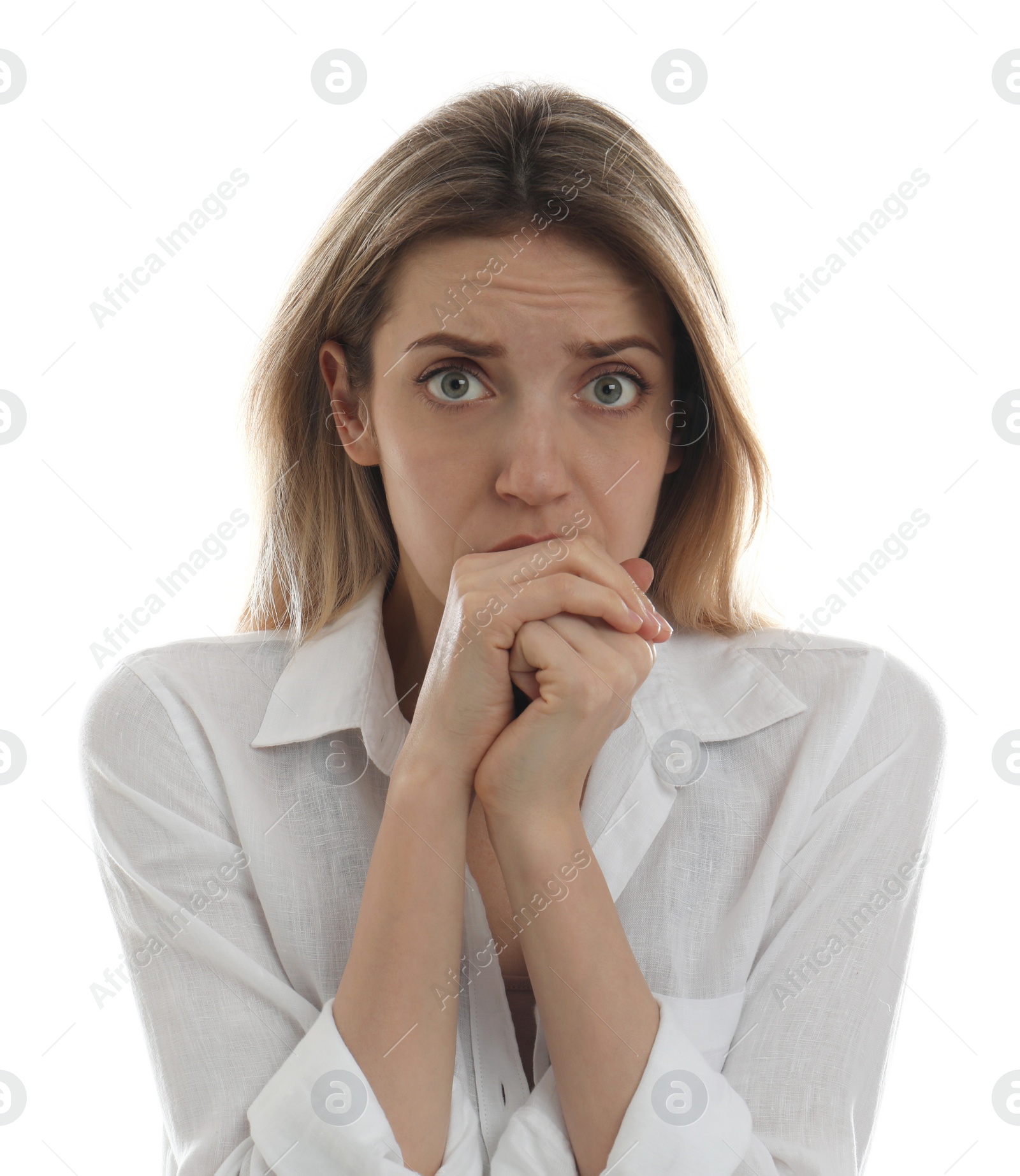 Photo of Young woman feeling fear on white background