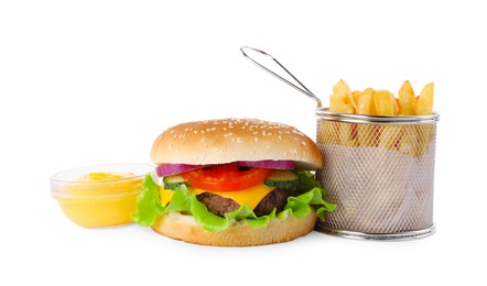 Photo of Delicious burger, cheese sauce and french fries on white background