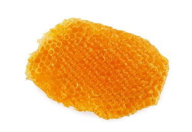 Piece of natural honeycomb with tasty honey isolated on white, top view