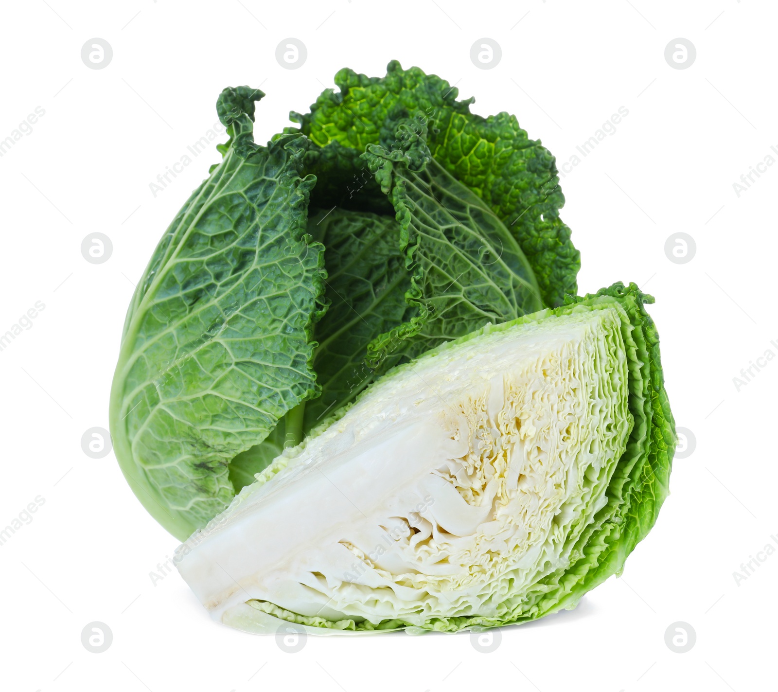 Photo of Whole and cut fresh savoy cabbages on white background