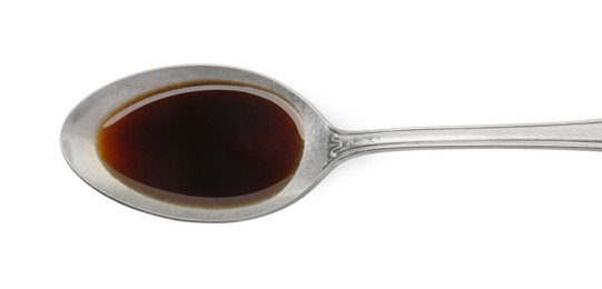 Photo of Tasty soy sauce in spoon isolated on white, top view