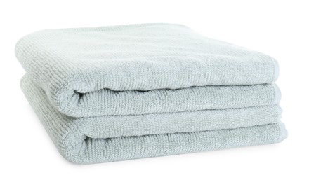 Photo of Soft folded terry towels isolated on white