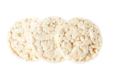 Photo of Crunchy rice cakes isolated on white, top view
