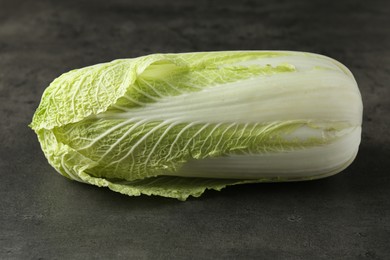 Fresh ripe Chinese cabbage on grey table