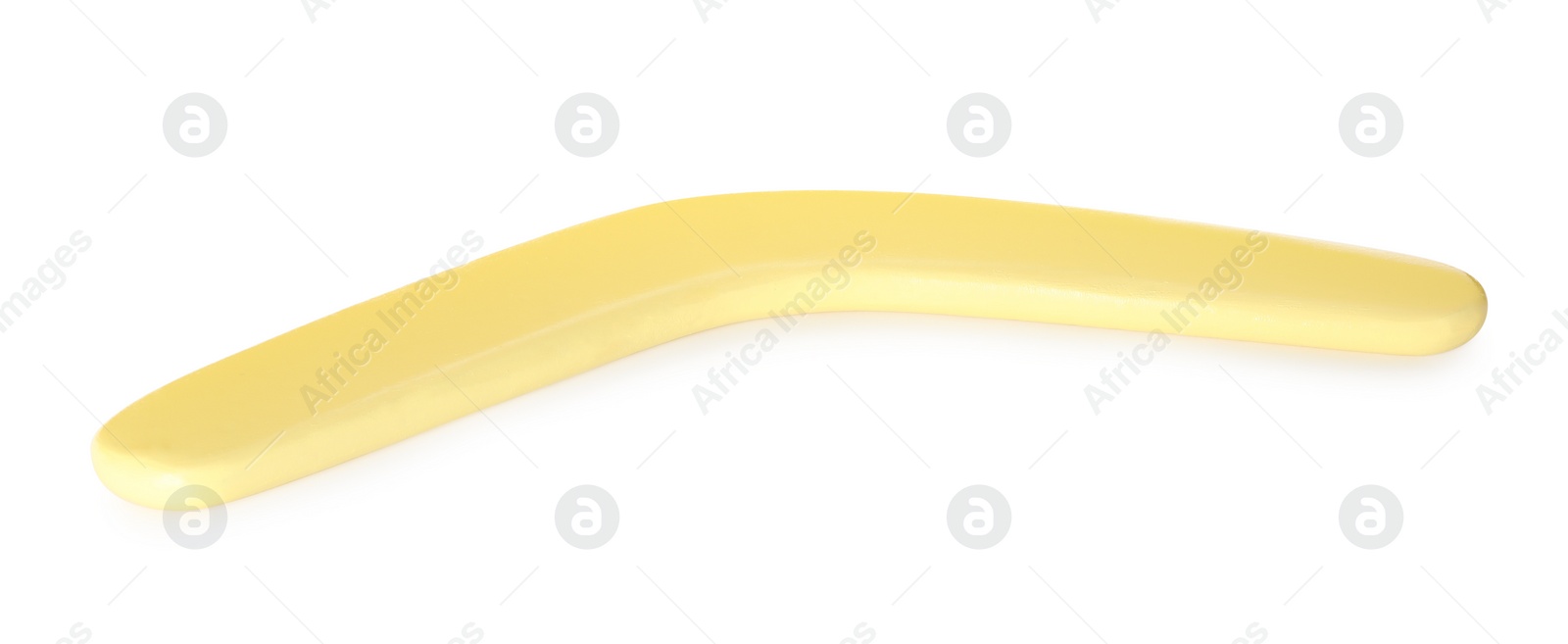 Photo of Yellow boomerang isolated on white. Outdoors activity