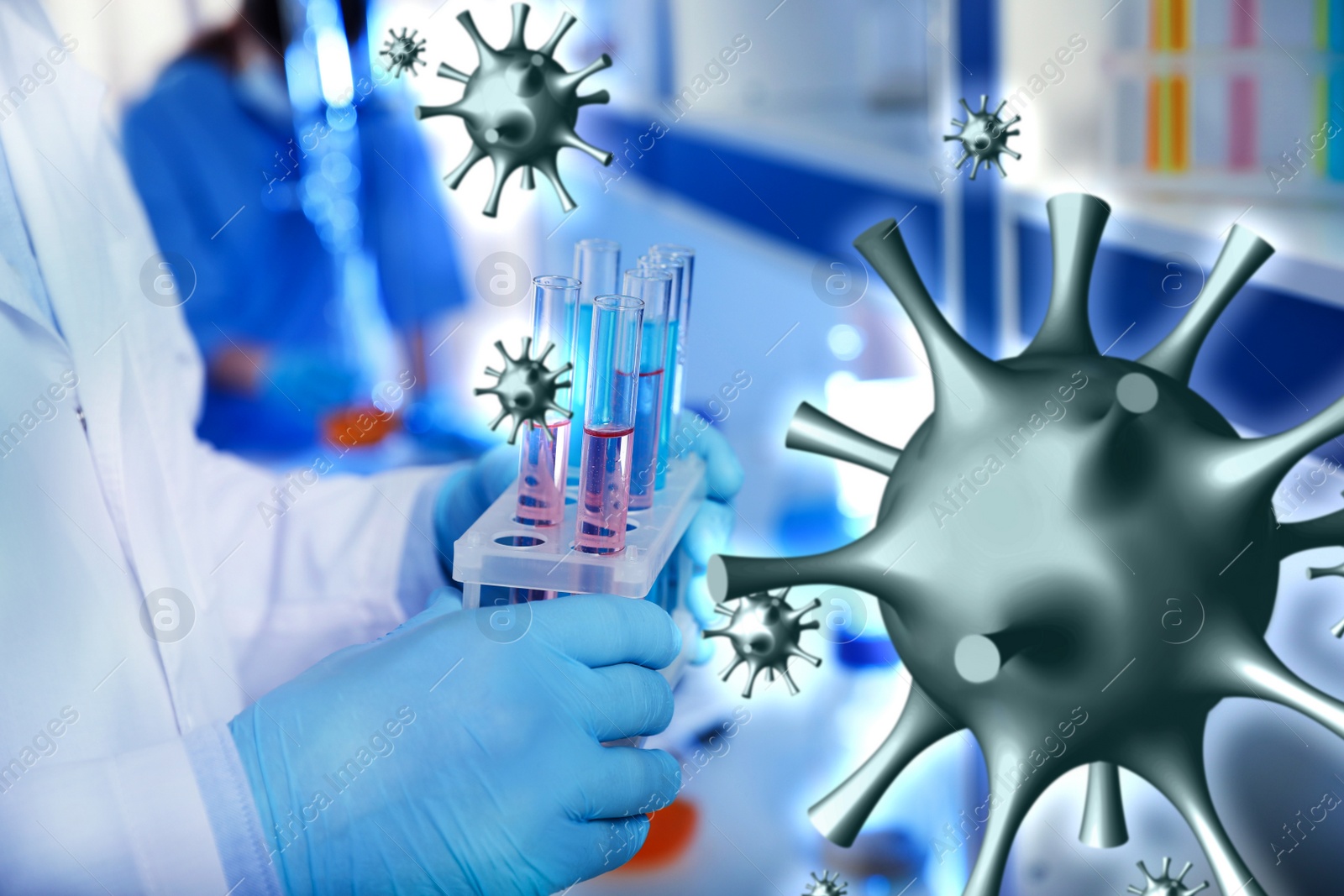 Image of Scientist holding test tubes with liquids in laboratory. Researching of coronavirus