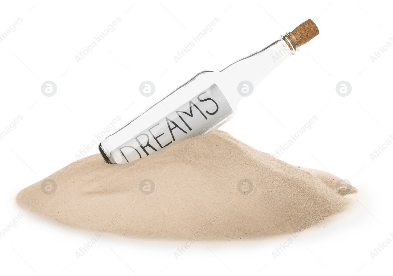 Photo of Corked glass bottle with Dreams note in sand on white background