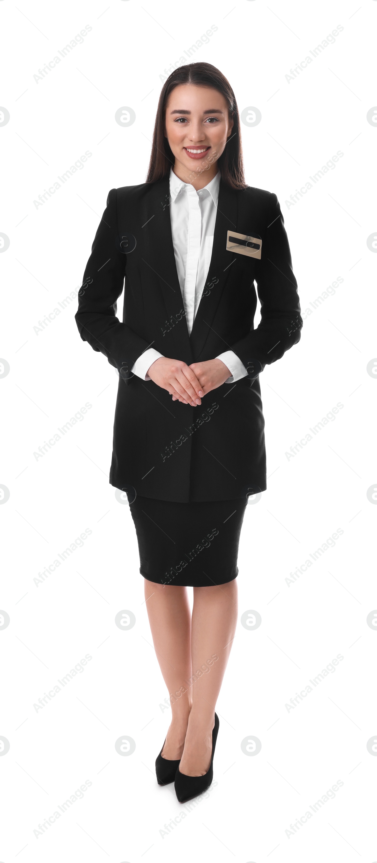 Photo of Full length portrait of happy young receptionist in uniform on white background