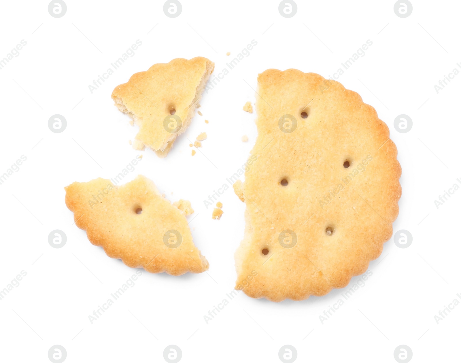 Photo of Crispy broken cracker isolated on white, top view