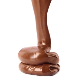 Photo of Pouring sweet chocolate cream on white background