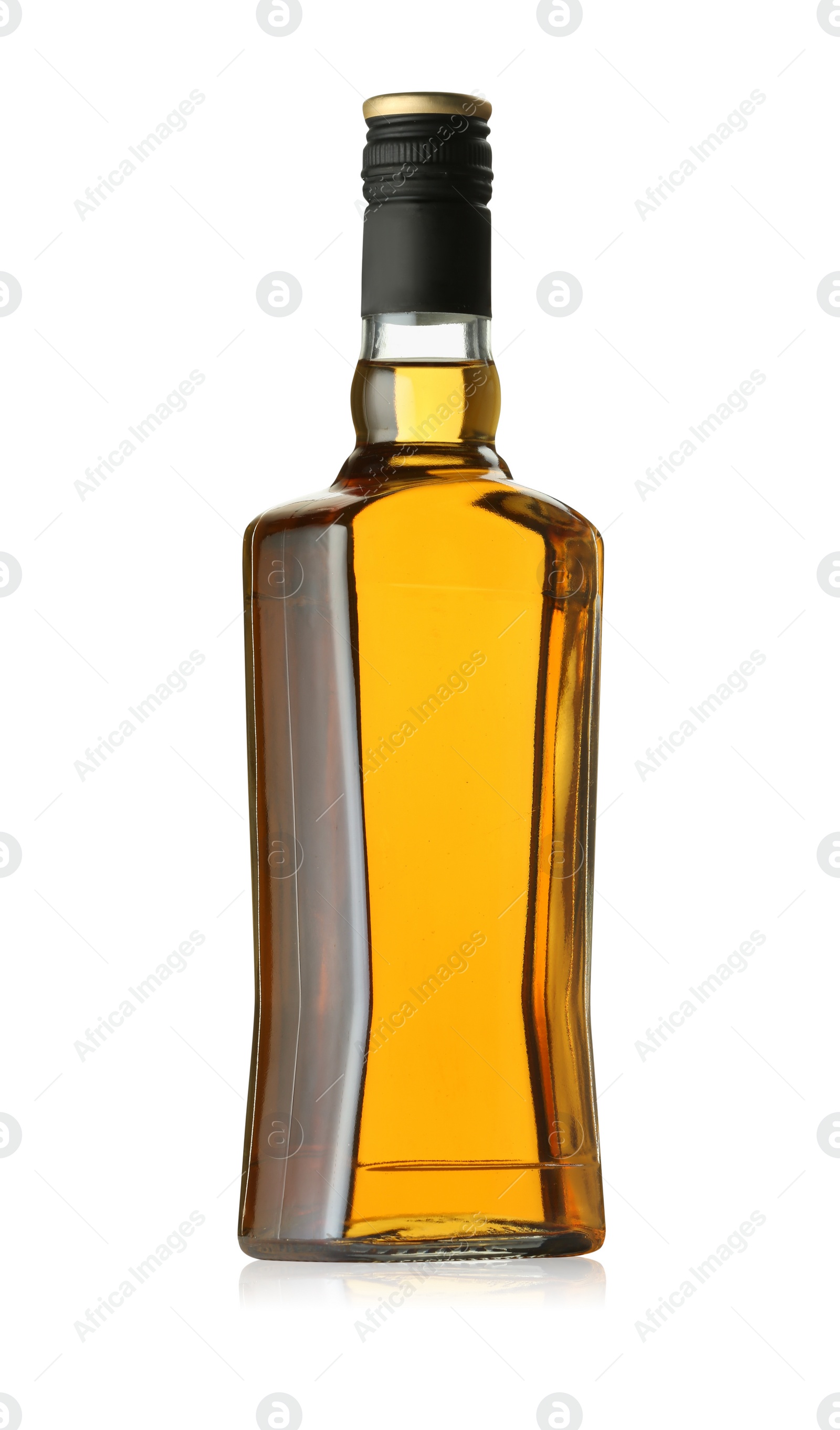 Photo of Whiskey in glass bottle isolated on white