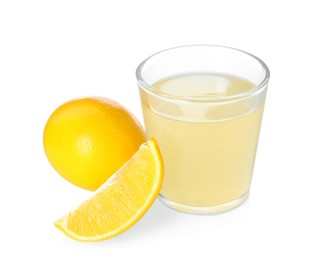 Freshly squeezed juice and lemons on white background