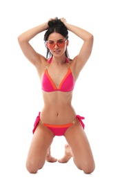 Photo of Beautiful young woman in stylish bikini with sunglasses on white background