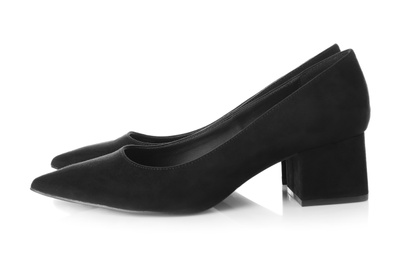 Pair of female shoes on white background